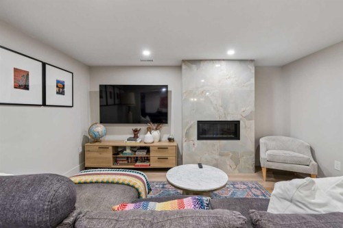 1414A 8 Avenue Se, Calgary, AB - Indoor With Fireplace