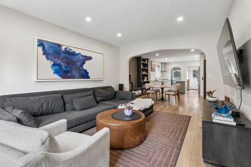 1414A 8 Avenue Se, Calgary, AB - Indoor Photo Showing Living Room