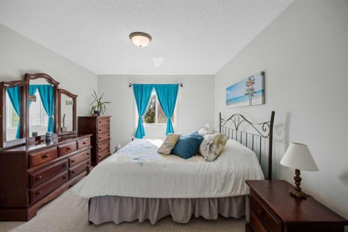 354 West Creek Springs, Chestermere, AB - Indoor Photo Showing Bedroom