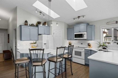 354 West Creek Springs, Chestermere, AB - Indoor Photo Showing Kitchen With Double Sink