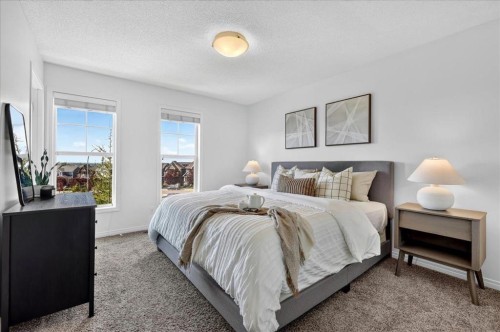24 Auburn Meadows Green Se, Calgary, AB - Indoor Photo Showing Bedroom