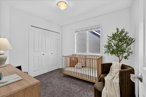 24 Auburn Meadows Green Se, Calgary, AB - Indoor Photo Showing Bedroom