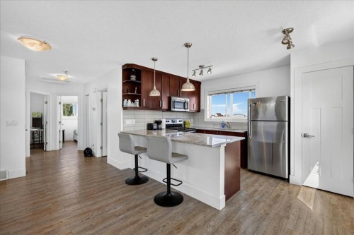 24 Auburn Meadows Green Se, Calgary, AB - Indoor Photo Showing Kitchen With Stainless Steel Kitchen With Upgraded Kitchen