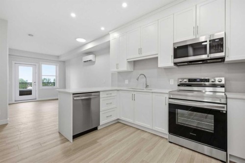 1410-81 Arbour Lake View Nw, Calgary, AB - Indoor Photo Showing Kitchen With Stainless Steel Kitchen With Upgraded Kitchen