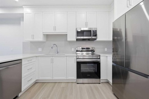 1410-81 Arbour Lake View Nw, Calgary, AB - Indoor Photo Showing Kitchen With Upgraded Kitchen