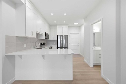 1410-81 Arbour Lake View Nw, Calgary, AB - Indoor Photo Showing Kitchen With Stainless Steel Kitchen With Upgraded Kitchen