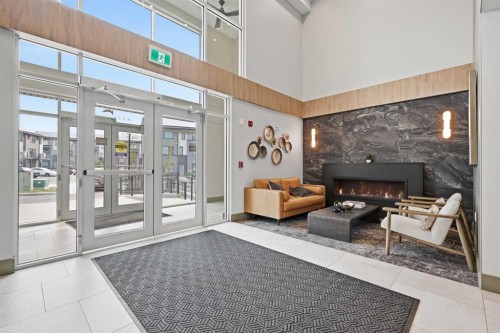 1410-81 Arbour Lake View Nw, Calgary, AB - Indoor Photo Showing Other Room With Fireplace