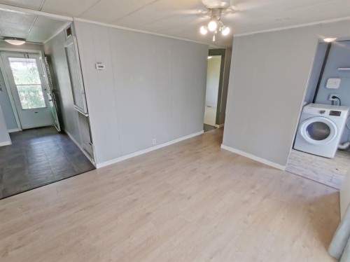 4809 52 Street, Stavely, AB - Indoor Photo Showing Laundry Room