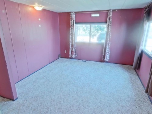4809 52 Street, Stavely, AB - Indoor Photo Showing Bedroom