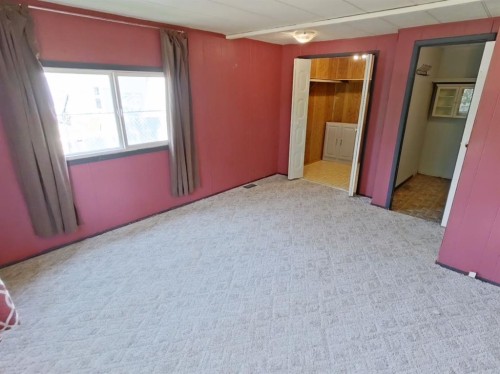 4809 52 Street, Stavely, AB - Indoor Photo Showing Bedroom