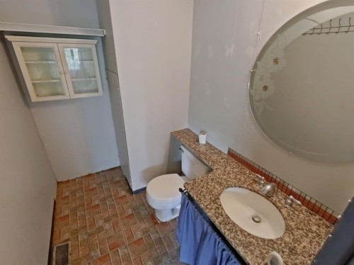 4809 52 Street, Stavely, AB - Indoor Photo Showing Bathroom