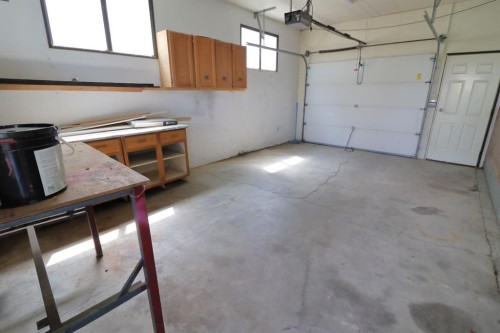 4809 52 Street, Stavely, AB - Indoor Photo Showing Garage