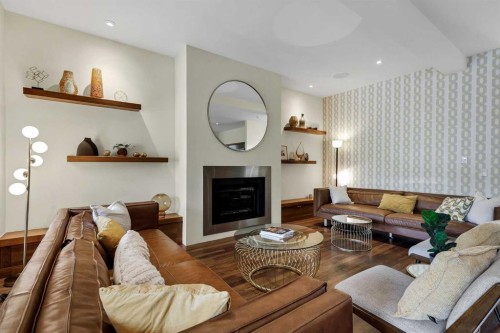 2330 7 Avenue Nw, Calgary, AB - Indoor Photo Showing Living Room With Fireplace