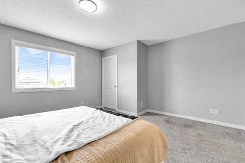 75 Evanscrest Way Nw, Calgary, AB - Indoor Photo Showing Bedroom