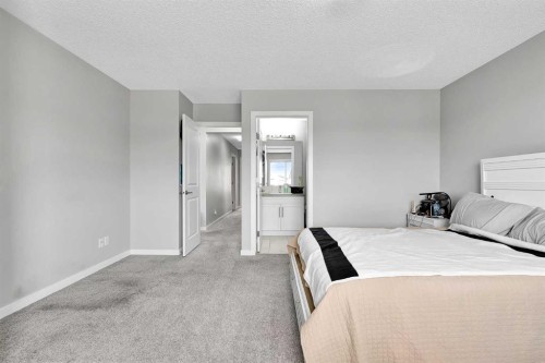 75 Evanscrest Way Nw, Calgary, AB - Indoor Photo Showing Bedroom