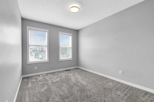 75 Evanscrest Way Nw, Calgary, AB - Indoor Photo Showing Other Room