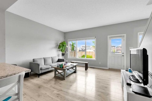 75 Evanscrest Way Nw, Calgary, AB - Indoor Photo Showing Living Room