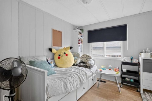 913 Spring Haven Court Se, Airdrie, AB - Indoor Photo Showing Bedroom