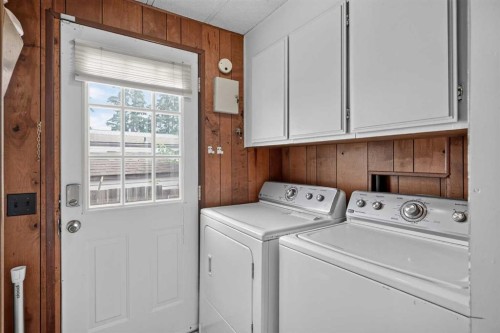913 Spring Haven Court Se, Airdrie, AB - Indoor Photo Showing Laundry Room