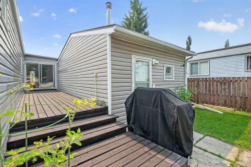 913 Spring Haven Court Se, Airdrie, AB - Outdoor With Deck Patio Veranda With Exterior