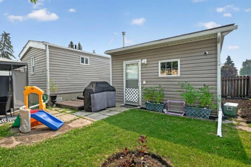 913 Spring Haven Court Se, Airdrie, AB - Outdoor With Deck Patio Veranda With Exterior
