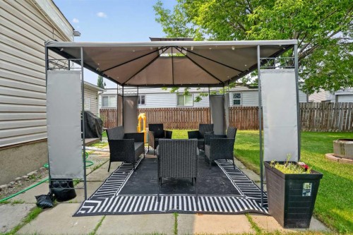 913 Spring Haven Court Se, Airdrie, AB - Outdoor With Deck Patio Veranda With Exterior