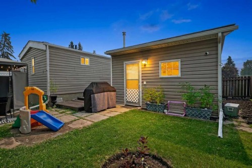 913 Spring Haven Court Se, Airdrie, AB - Outdoor With Deck Patio Veranda With Exterior