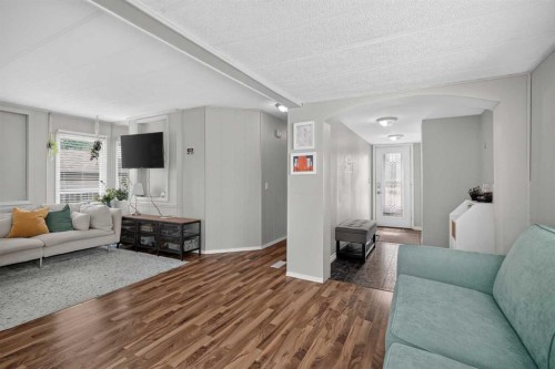 913 Spring Haven Court Se, Airdrie, AB - Indoor Photo Showing Living Room