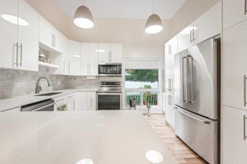 70 Brae Glen Lane Sw, Calgary, AB - Indoor Photo Showing Kitchen With Stainless Steel Kitchen With Upgraded Kitchen