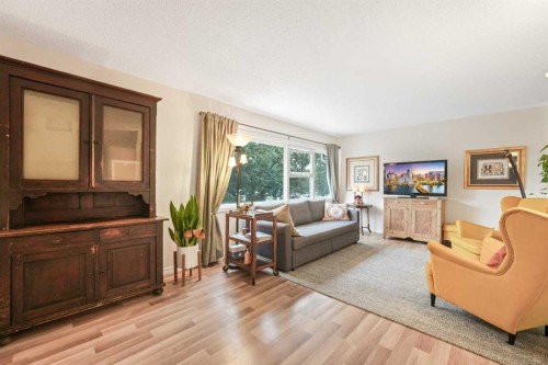 70 Brae Glen Lane Sw, Calgary, AB - Indoor Photo Showing Living Room