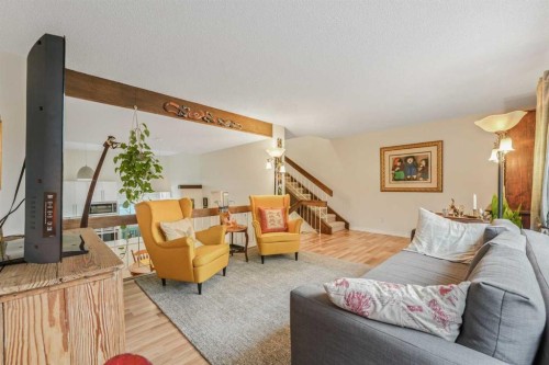 70 Brae Glen Lane Sw, Calgary, AB - Indoor Photo Showing Living Room