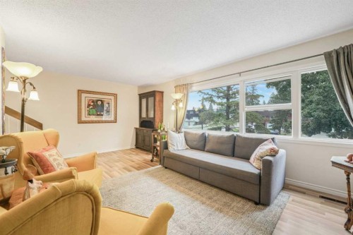 70 Brae Glen Lane Sw, Calgary, AB - Indoor Photo Showing Living Room