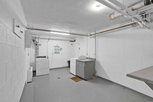 104-6919 Elbow Drive Sw, Calgary, AB - Indoor Photo Showing Garage