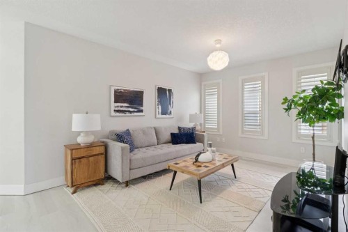 1826 Baywater Street Sw, Airdrie, AB - Indoor Photo Showing Living Room
