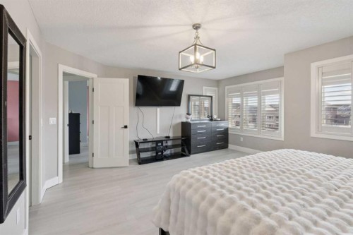 1826 Baywater Street Sw, Airdrie, AB - Indoor Photo Showing Bedroom