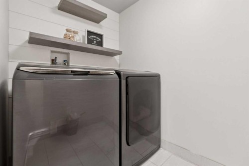 1826 Baywater Street Sw, Airdrie, AB - Indoor Photo Showing Laundry Room