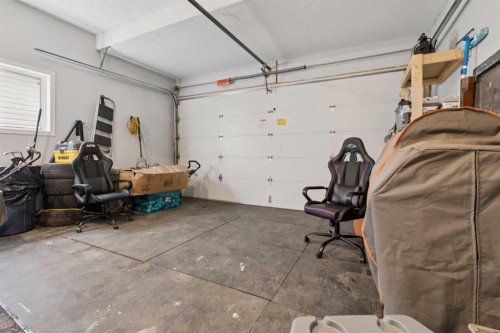 1826 Baywater Street Sw, Airdrie, AB - Indoor Photo Showing Garage