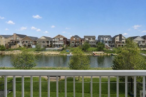 1826 Baywater Street Sw, Airdrie, AB - Outdoor With Body Of Water