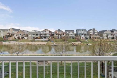 1826 Baywater Street Sw, Airdrie, AB - Outdoor With Body Of Water