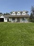 192 Range Road Range North, Grassland, AB  - Outdoor With Deck Patio Veranda With Facade 