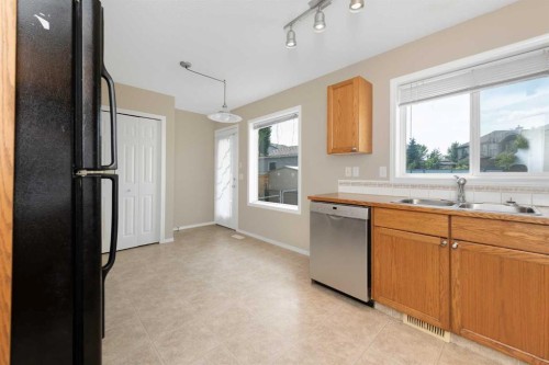 169 Everstone Drive Sw, Calgary, AB - Indoor Photo Showing Kitchen With Double Sink