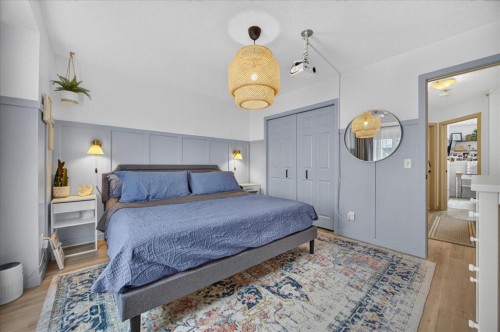 146 Sunset Road, Cochrane, AB - Indoor Photo Showing Bedroom
