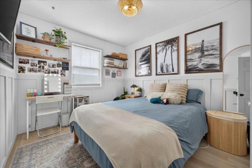 146 Sunset Road, Cochrane, AB - Indoor Photo Showing Bedroom