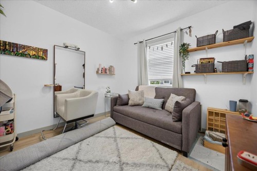 146 Sunset Road, Cochrane, AB - Indoor Photo Showing Other Room