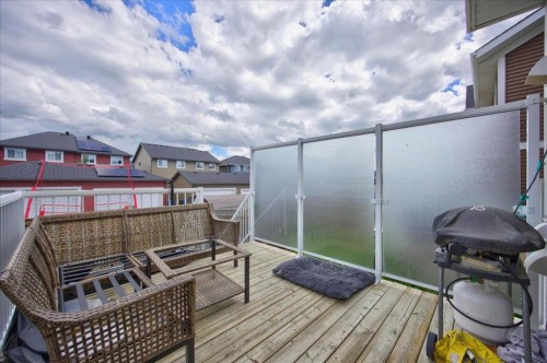 146 Sunset Road, Cochrane, AB - Outdoor With Deck Patio Veranda With Exterior
