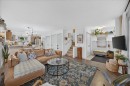 146 Sunset Road, Cochrane, AB  - Indoor Photo Showing Living Room 