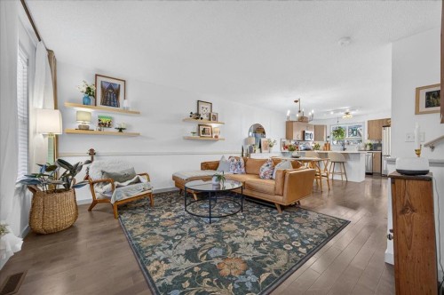 146 Sunset Road, Cochrane, AB - Indoor Photo Showing Living Room