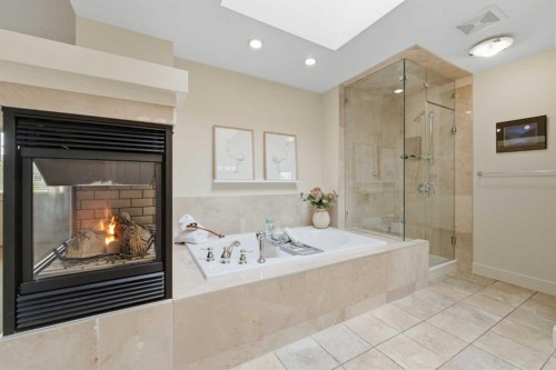 8216 9 Avenue Sw, Calgary, AB - Indoor Photo Showing Other Room With Fireplace