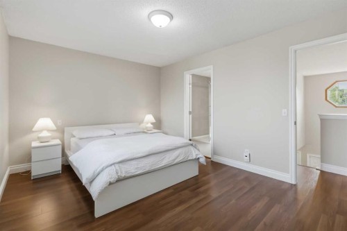 307 Hidden Cove Nw, Calgary, AB - Indoor Photo Showing Bedroom