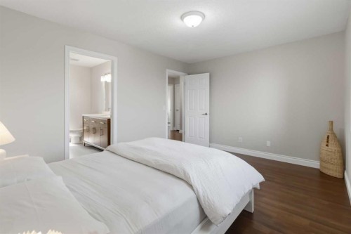 307 Hidden Cove Nw, Calgary, AB - Indoor Photo Showing Bedroom